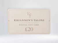 A digital gift card for Rhiannon's Talons, featuring a cream-colored rectangular card with elegant rose gold typography and border details, set against a soft light gray background.
