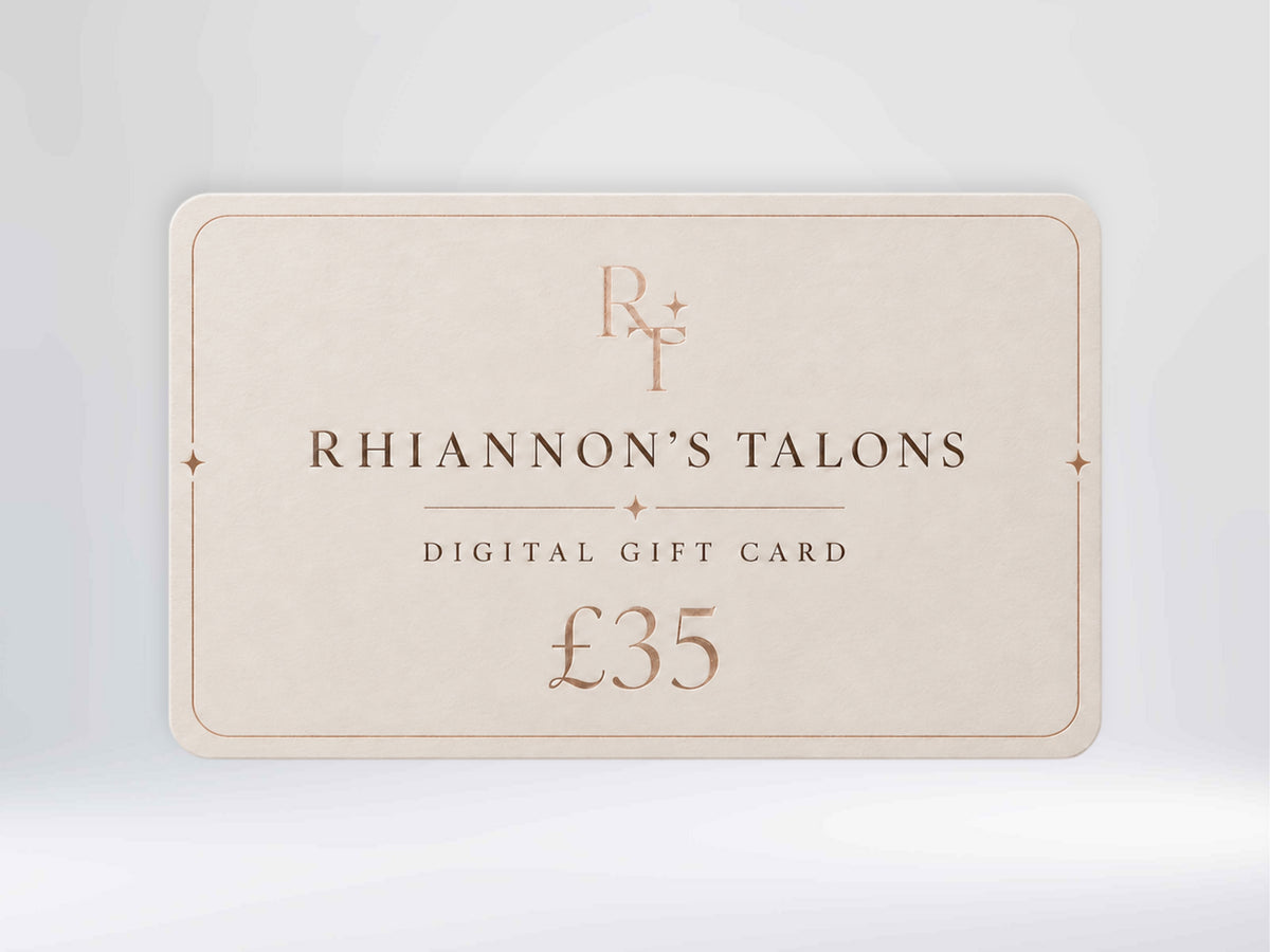 A digital gift card for Rhiannon's Talons, valued at £35, shown against a light gray gradient background. The card is a warm cream color with elegant rose gold typography and border details.
