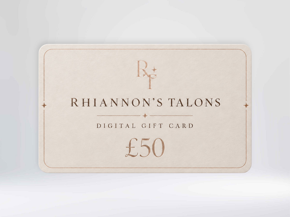 A Rhiannon's Talons digital gift card for £50, shown as a cream-colored rectangular card with elegant rose gold typography and border details, set against a soft light gray background.