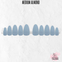 Arctic Angel pale blue medium almond press-on nails with glossy finish