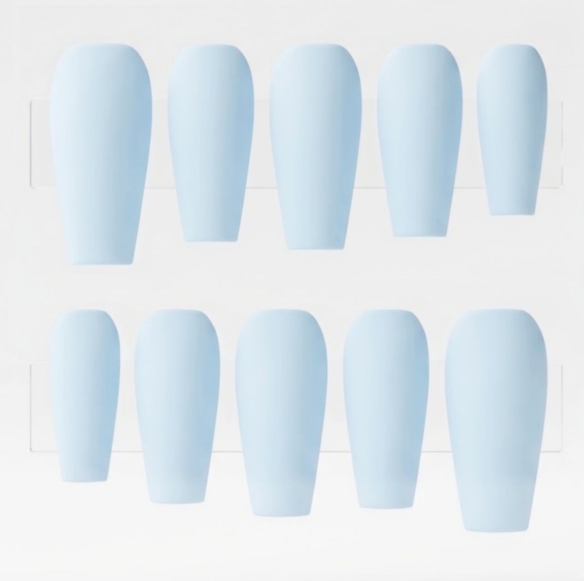 Ten light blue press-on nails arranged in two rows of five on a white display card.