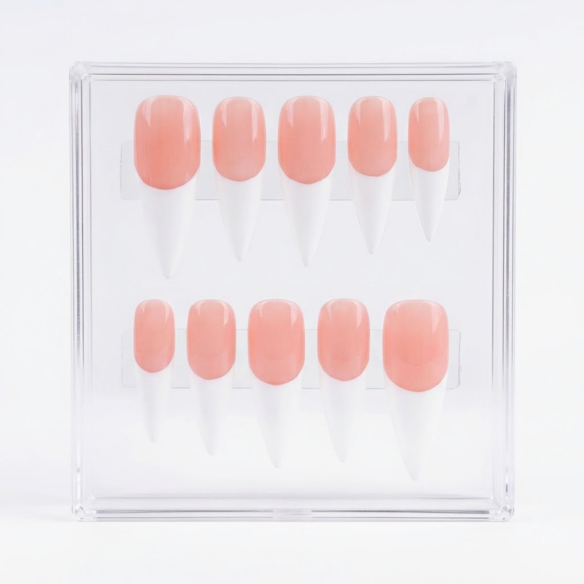 A set of 10 false press-on nails in a clear acrylic display box, featuring a glossy peachy-pink color base and white french tips.