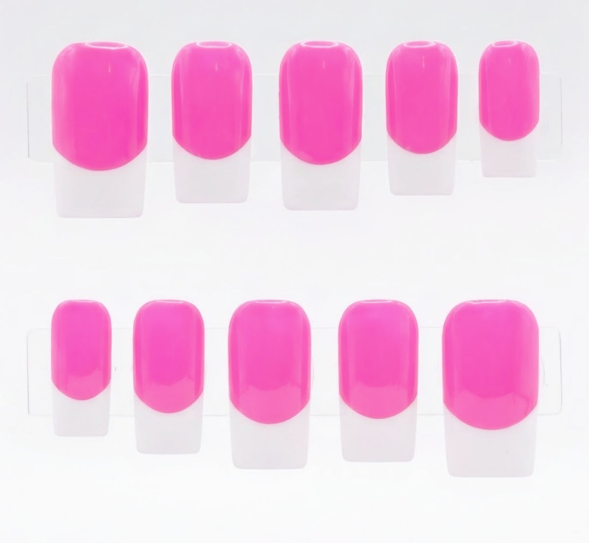 A set of press-on nails displayed on clear plastic hangers, featuring a vibrant hot pink color base and white french tips.