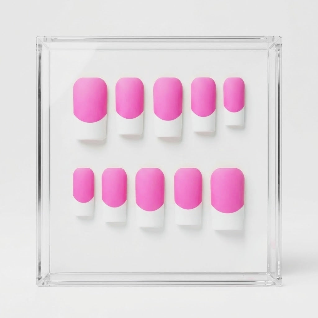 A set of ten press-on nails with a pink and white French tip design, displayed inside a clear acrylic case on a white background.