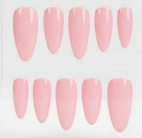 Ten glossy pink press-on nails arranged in two rows of five on a plain white background.