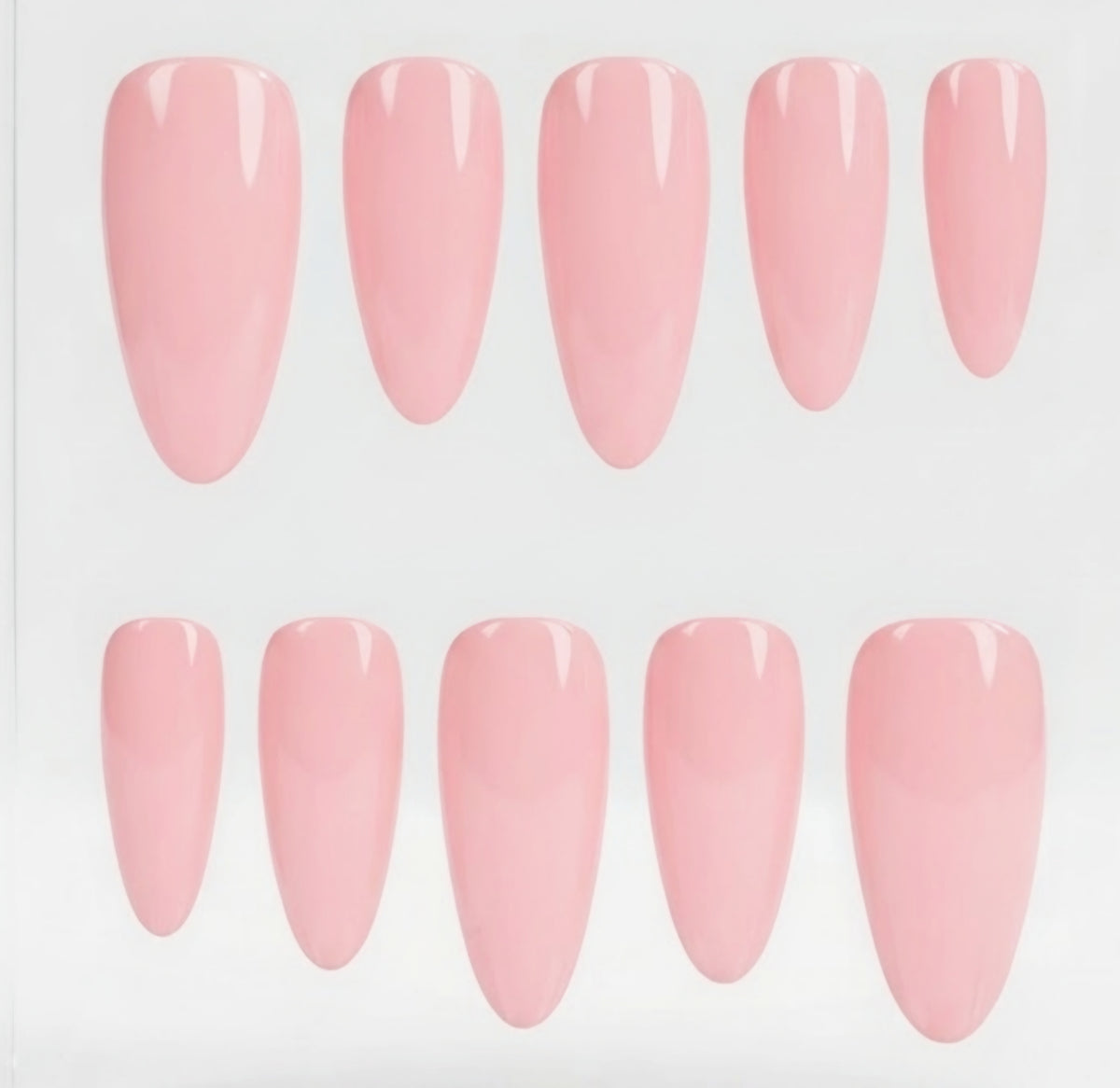 Ten glossy pink press-on nails arranged in two rows of five on a plain white background.