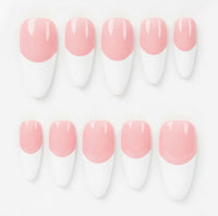 Ten almond-shaped press-on nails with a pink and white French tip design, arranged in two rows on a clean white background.