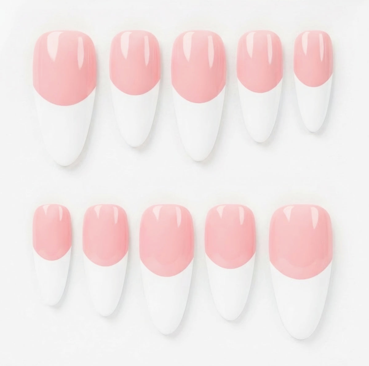 Ten almond-shaped press-on nails with a pink and white French tip design, arranged in two rows on a clean white background.