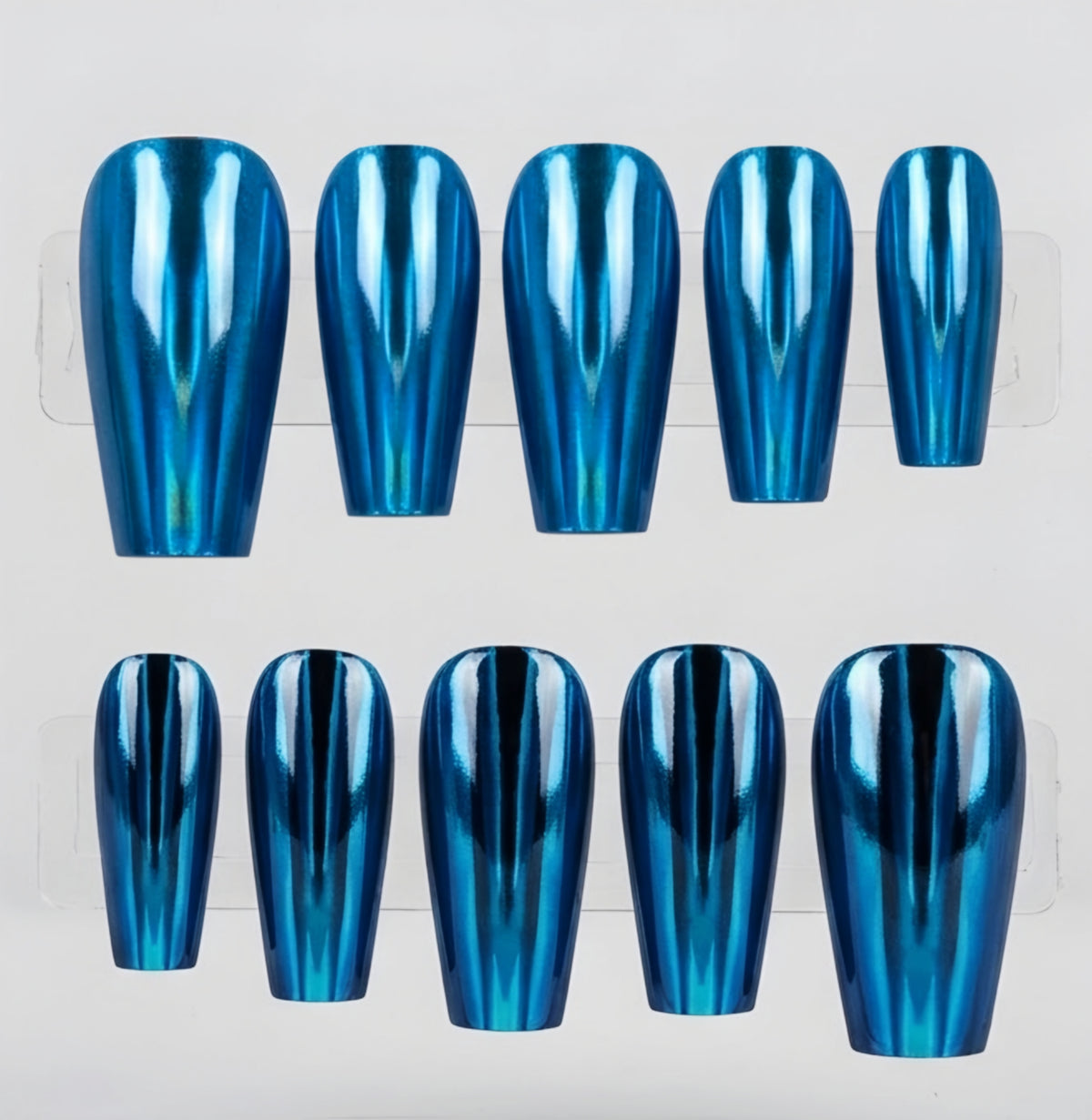 Ten metallic blue chrome press-on nails arranged in two rows of five on a clear display card against a light gray background.