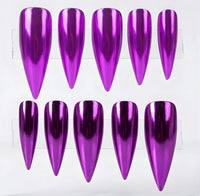 Ten metallic purple stiletto false nails arranged in two rows on a clear display stand against a white background.