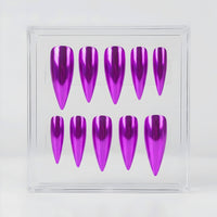 Ten metallic purple false press-on nails arranged in two rows inside a clear acrylic display box on a white background.