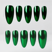 Ten glossy metallic chrome green press-on nails arranged in two rows on a clear display card against a light gray background.