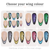 A color selection chart for butterfly wing press on nails, showing six options: Multicolour, Purple, Green, Silver, Gold, Pink, and Blue. Each option displays a pair of nude nails with a butterfly wing design in different colors.