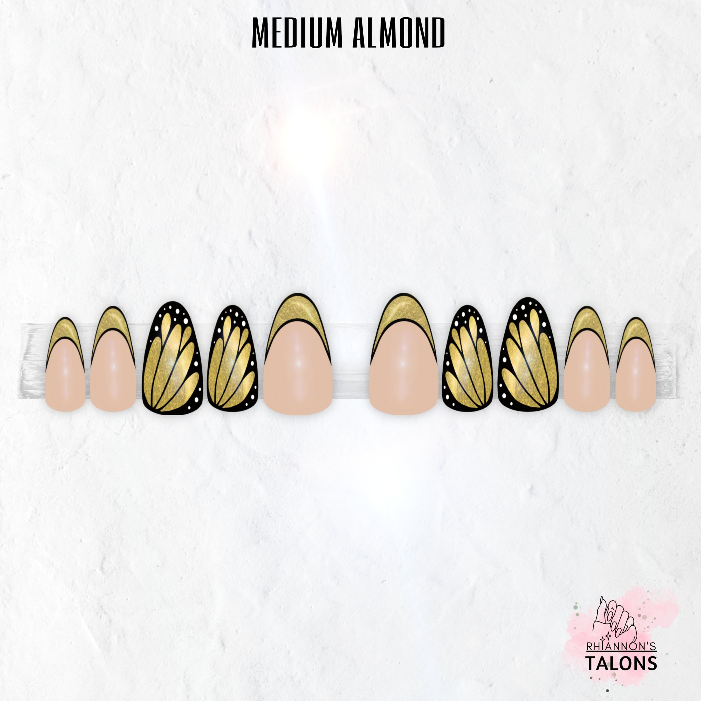Flutterfly butterfly wing press-on nails with nude base, black wing nail art, shimmer colour accents and glossy medium almond false nails.
