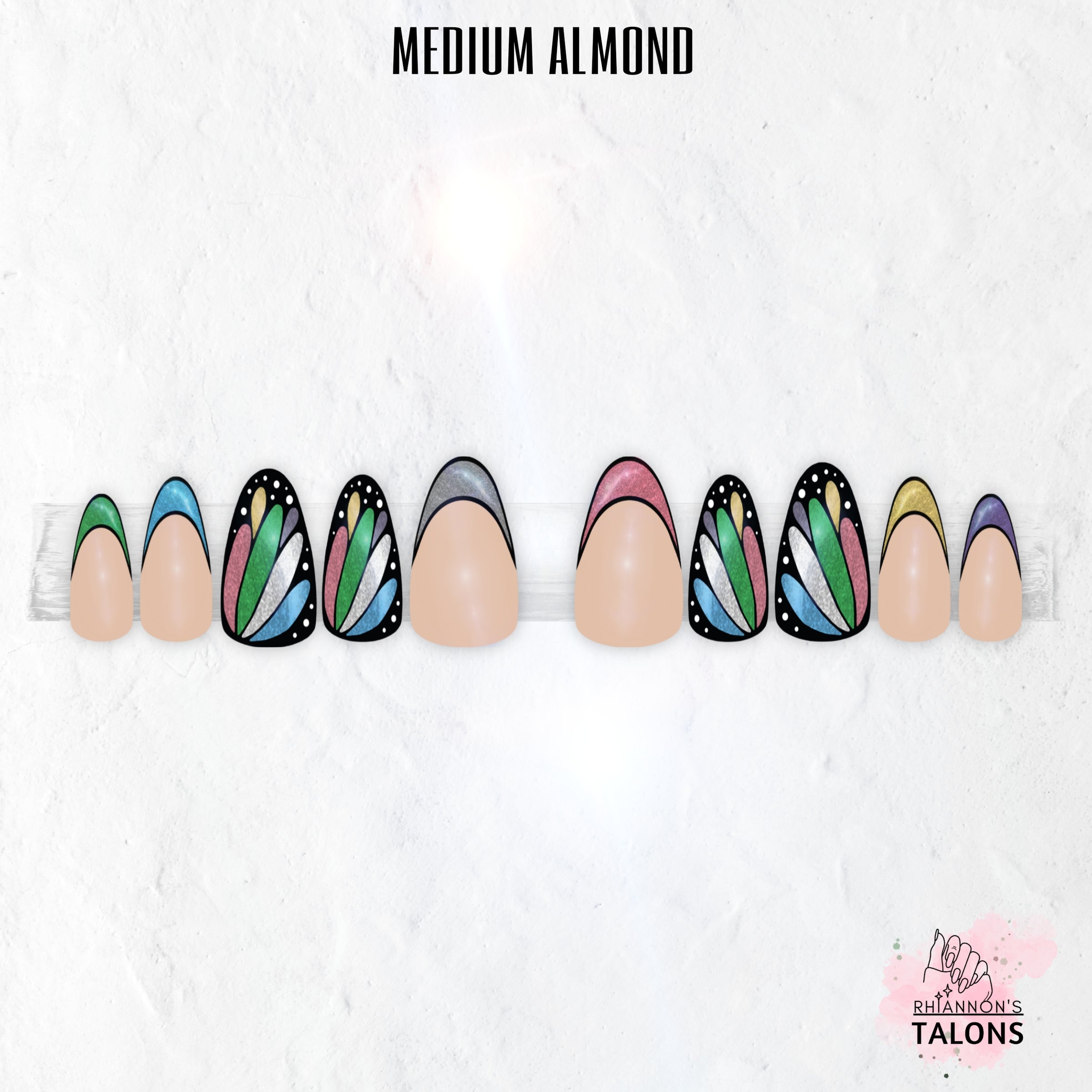 Flutterfly butterfly wing press-on nails with nude base, black wing nail art, shimmer colour accents and glossy medium almond false nails.