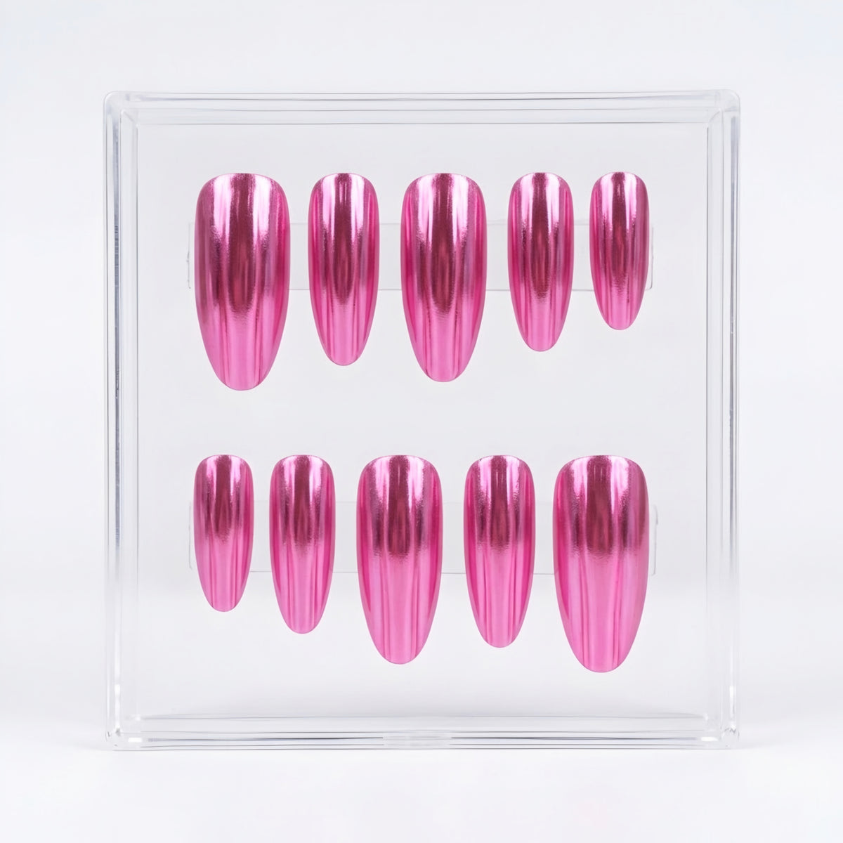 A set of ten metallic chrome pink press-on nails displayed inside a clear acrylic box against a white background.