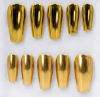 Ten metallic gold chrome coffin-shaped press-on nails arranged in two rows on a white background.