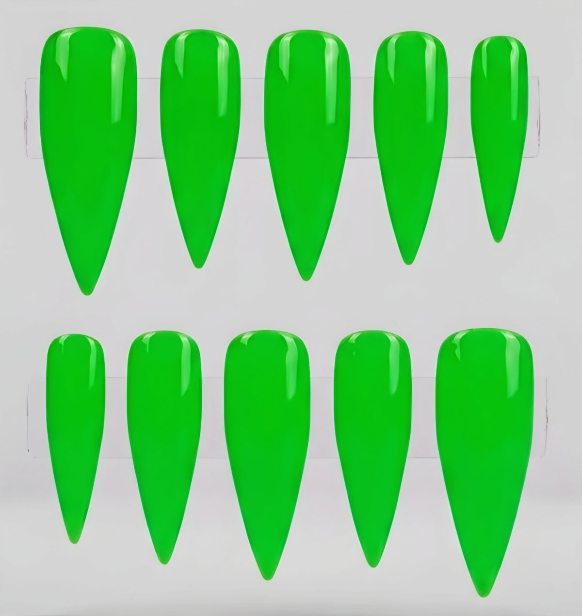 Ten bright neon green stiletto-shaped press-on nails arranged in two rows on a white background.