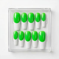 Ten press-on nails in a clear plastic case, featuring a neon green and white French tip design.