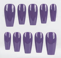 A set of ten glossy purple press-on nails arranged in two rows on a white background.