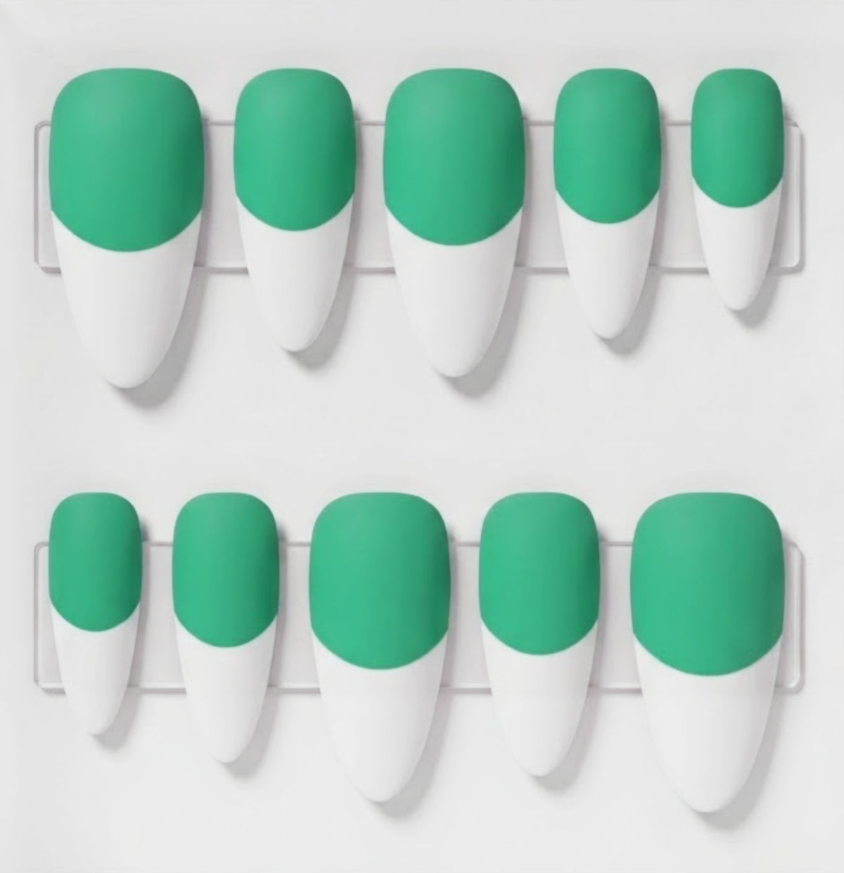A set of artificial press-on nails arranged in two rows on a white display card. Each nail is half mint green base and french tips, shown against a clean white background.