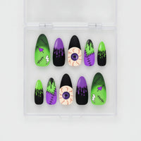 Monster Mash green purple and black Halloween press-on nails with eyeballs, dripping goo and monster nail art