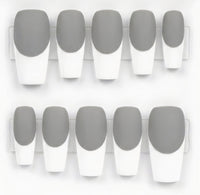 Ten false press-on nails arranged in two rows on clear plastic tabs, featuring a gray and white French tip design.