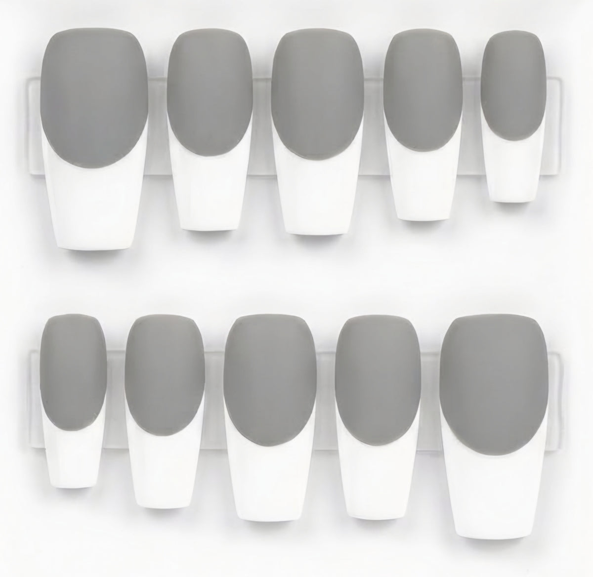 Ten false press-on nails arranged in two rows on clear plastic tabs, featuring a gray and white French tip design.