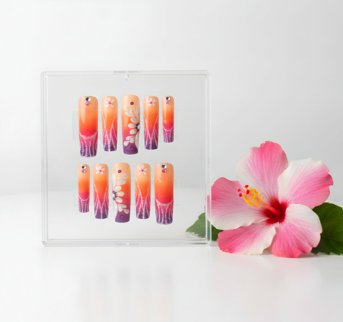 Tropical Blush pink and peach ombré press-on nails with 3D floral nail art