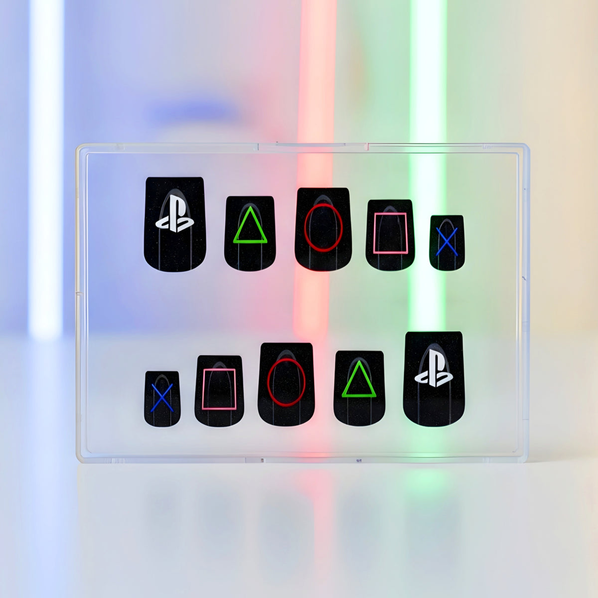 Player One black gaming press-on nails with colourful console-inspired nail art