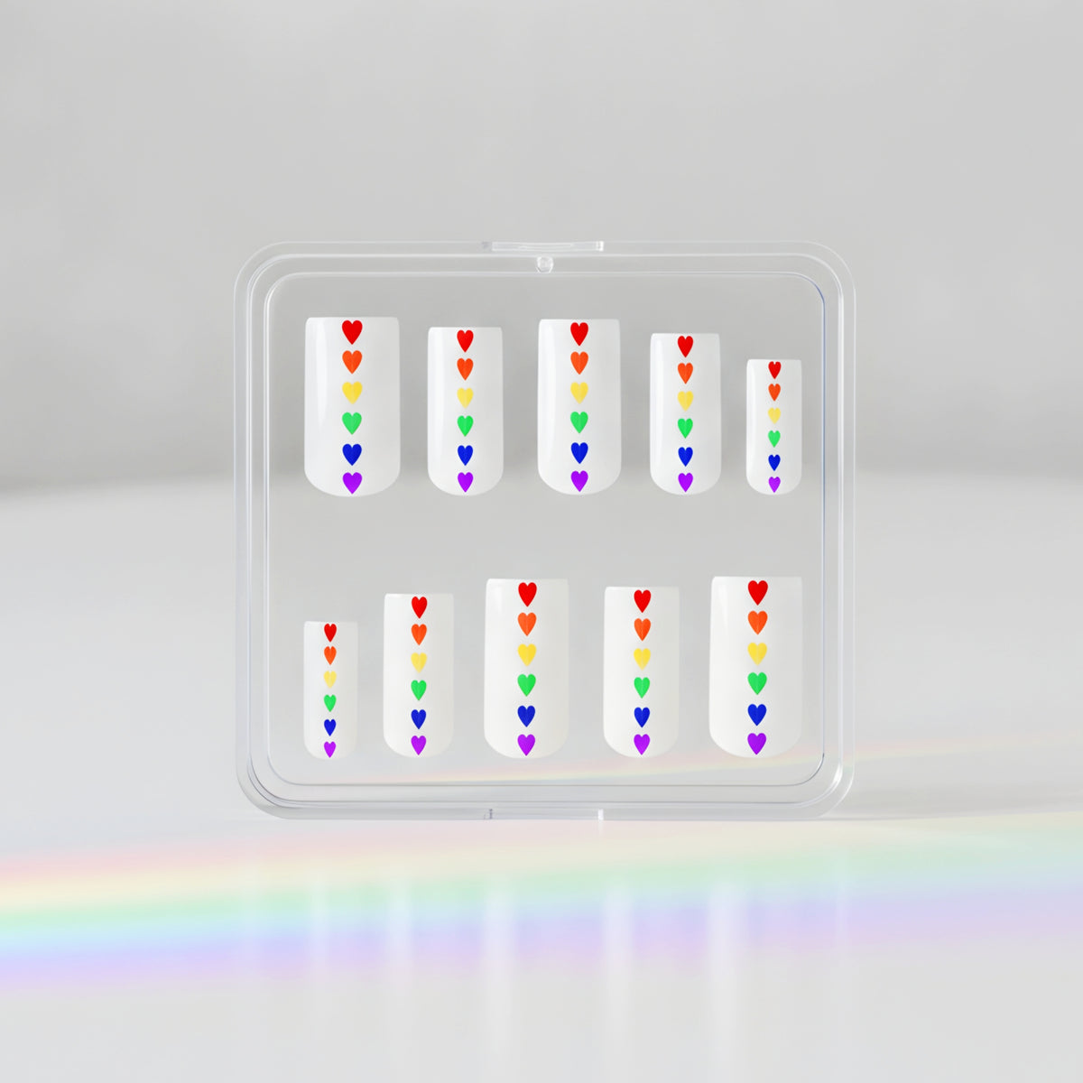 Love is Love white press-on nails with rainbow heart Pride nail art