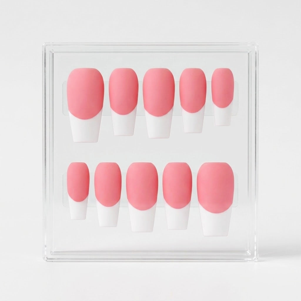 A set of 10 press-on nails with a pink and white French tip design, displayed inside a clear acrylic case on a light gray background.