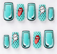 A set of square press-on nails arranged in two rows on a white background. The nails feature a turquoise and black pop-art design, with two nails displaying a red lips and tongue graphic and two displaying a white comic-style starburst with the word 'POP'.