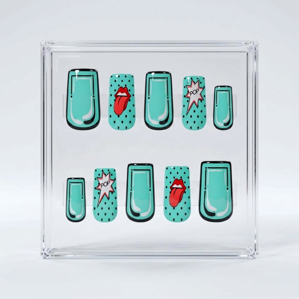 A set of square press on nails displayed inside a clear square acrylic box on a light gray background. The design features a repeating pattern of mint green nail shapes with black polka dots, outlined in black, and two mint green nails with red Rolling Stones tongue-and-lips motifs and black polka dots.