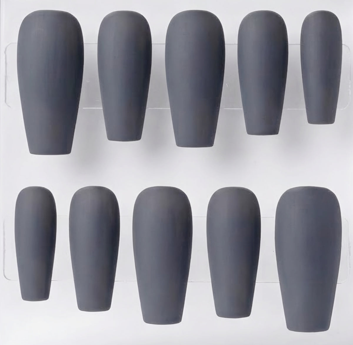 Ten matte dark gray coffin-shaped press-on nails arranged in two rows of five on a white background.