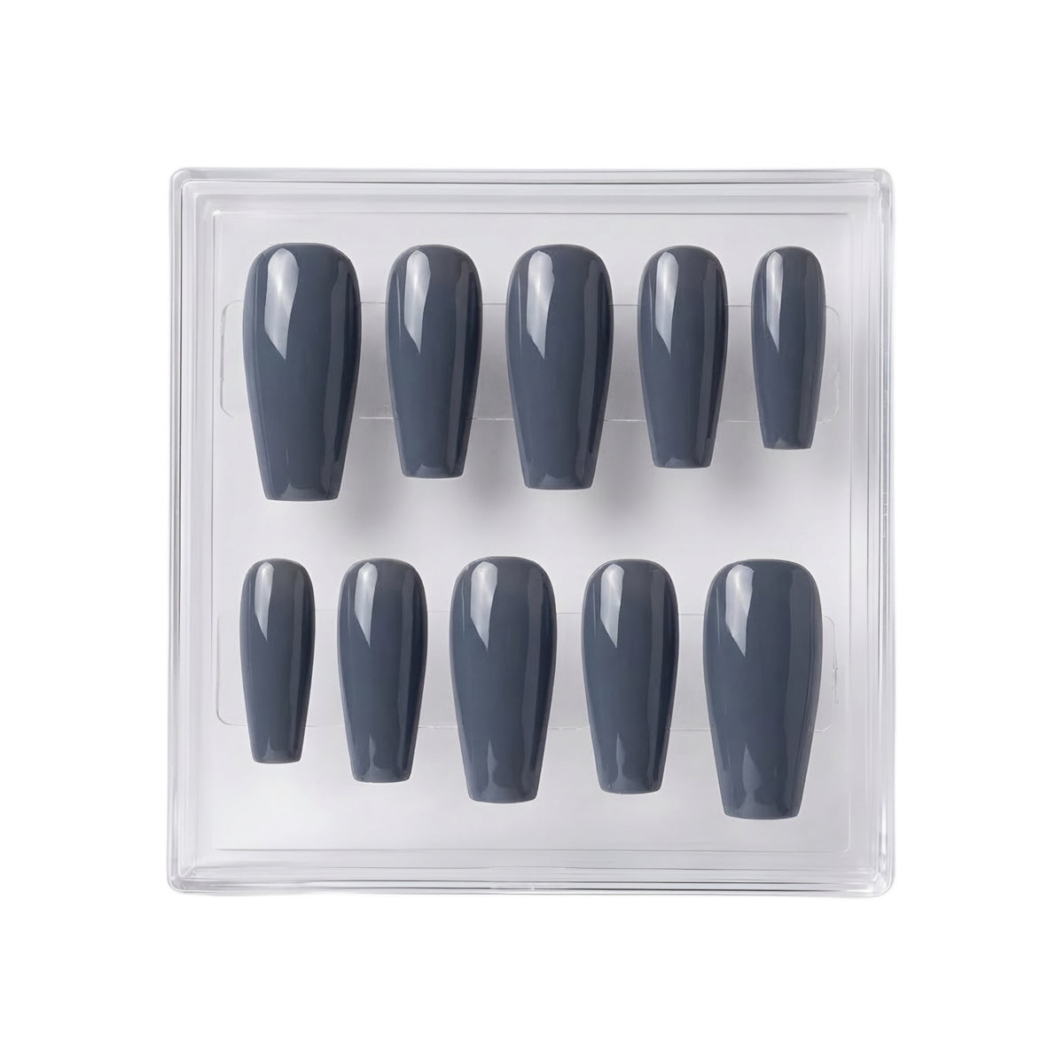 A set of ten press-on nails in a clear plastic display case, featuring a glossy dark gray color.