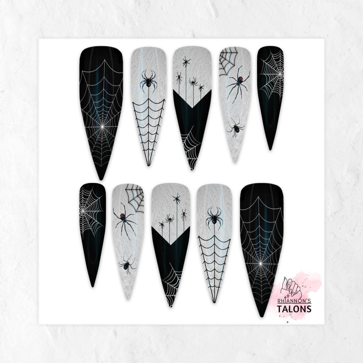 Web of Lies Halloween press-on nails with black spiderweb nail art, creepy spiders and white accents